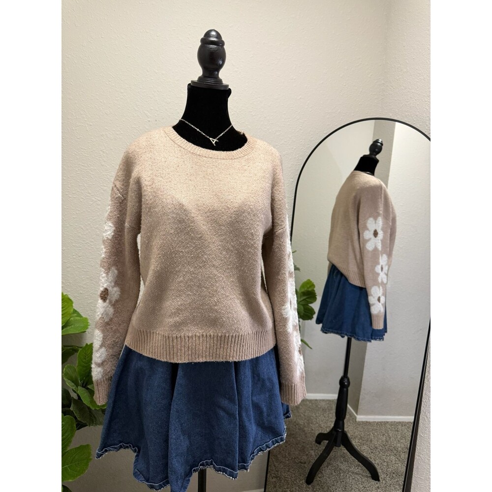 Women's beige crewneck sweater with floral sleeves
